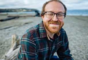 Hemophilia A Patient, Billy Eshleman, smiling at the beach