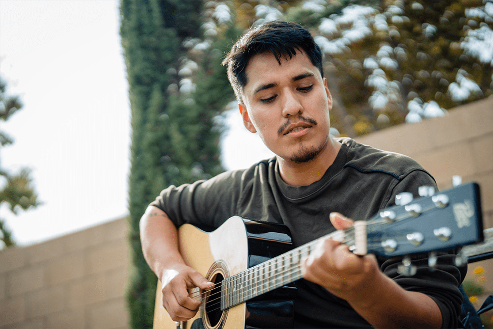 Hemophilia A patient, Daniel Cruz, playing guitar Hemophilia A patient, Daniel Cruz, playing guitar